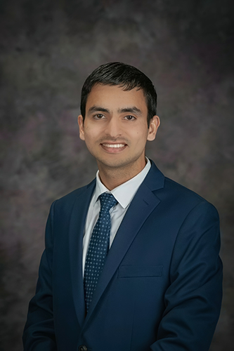 headshot of Sachin Dhanda
